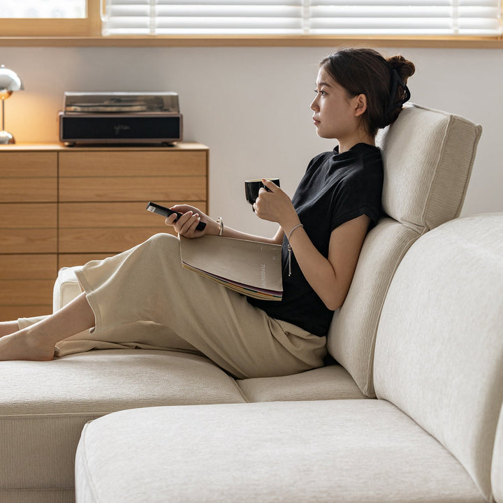 Minimalist genuine leather electric recliner 4 seater sofa bed string in real life style.