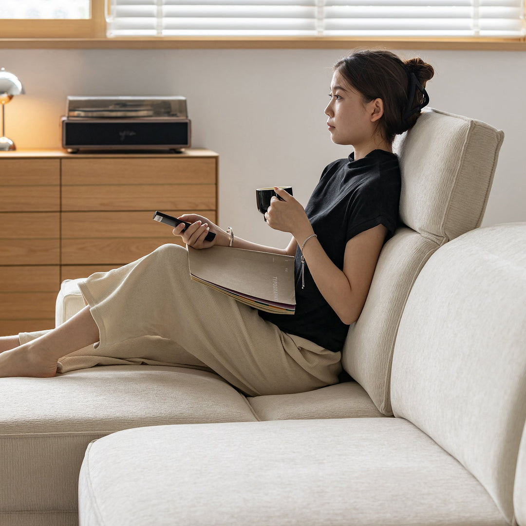 Minimalist genuine leather electric recliner 4 seater sofa bed string in real life style.