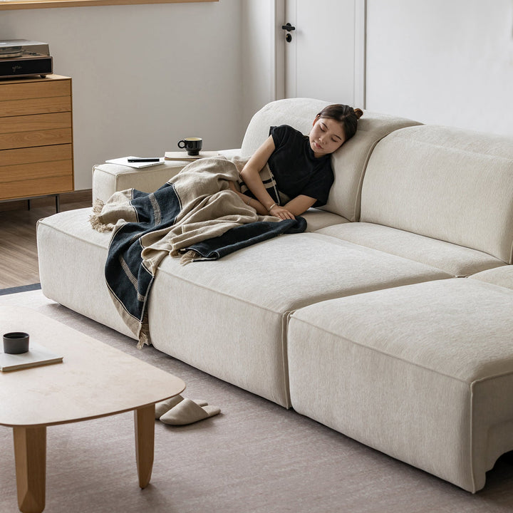 Minimalist genuine leather electric recliner 4 seater sofa bed string in panoramic view.