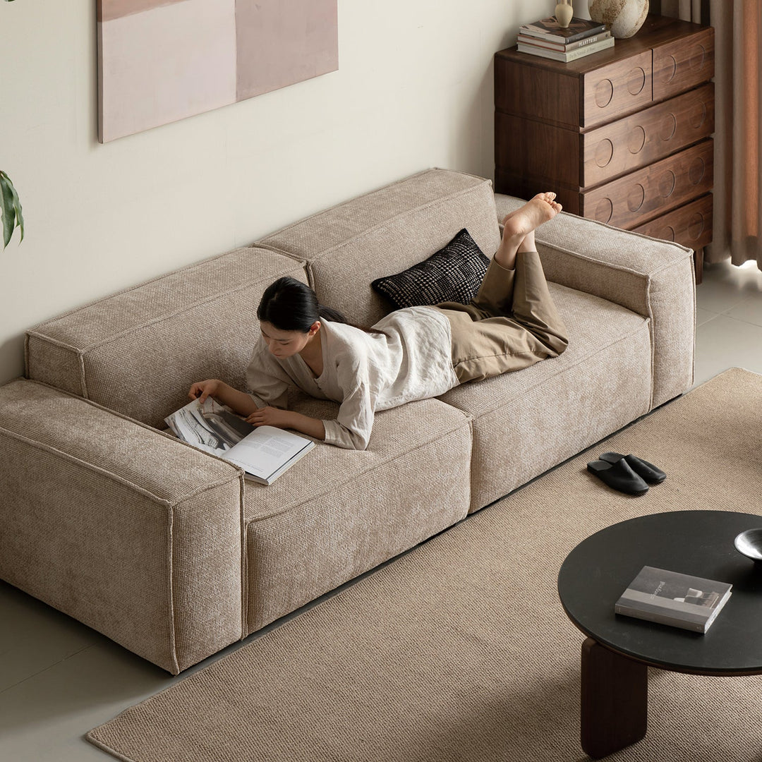 Minimalist linen fabric 4 seater sofa camaleonda with context.