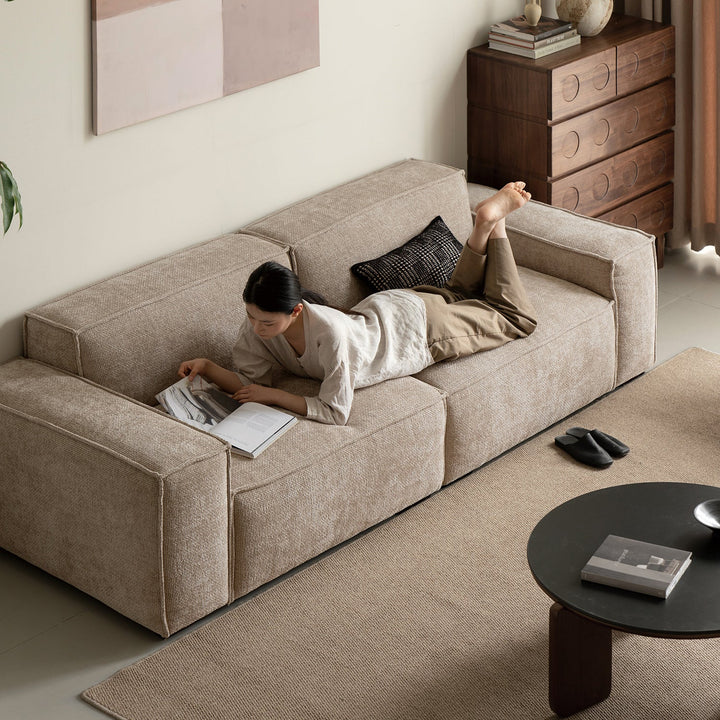 Minimalist linen fabric 4 seater sofa camaleonda with context.