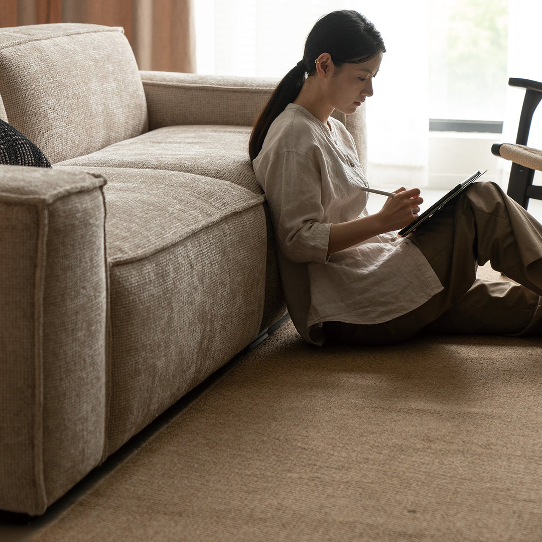 Minimalist linen fabric 4 seater sofa camaleonda in panoramic view.