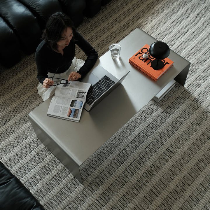 Bauhaus steel coffee table arc in panoramic view.