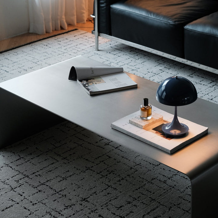Bauhaus steel coffee table arc in close up details.
