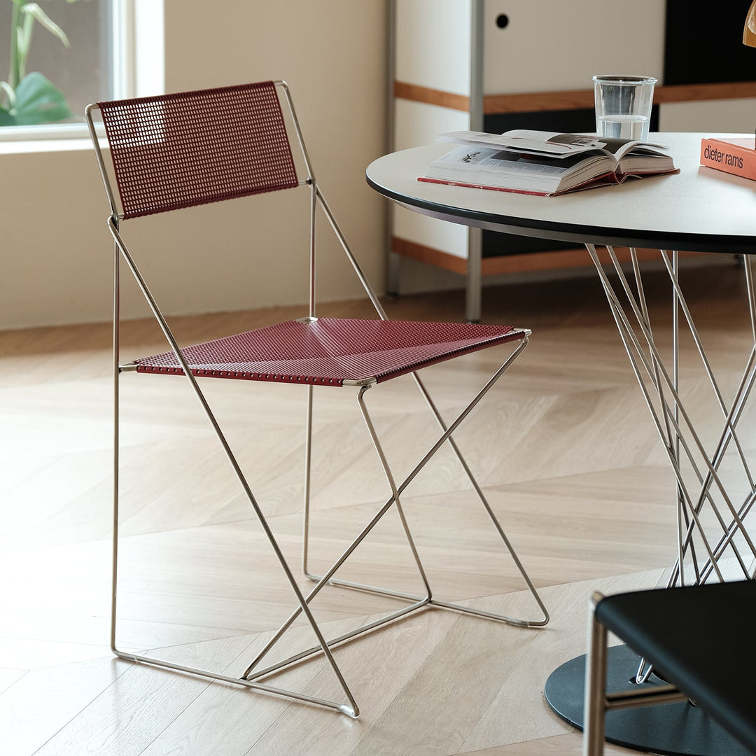 Bauhaus steel dining chair x-line in panoramic view.