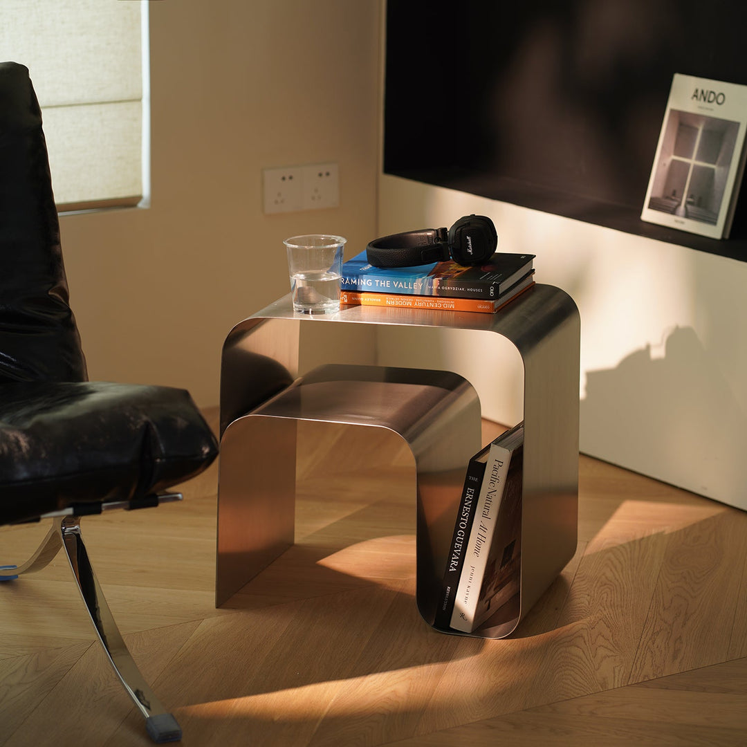 Minimalist steel side table arc color swatches.