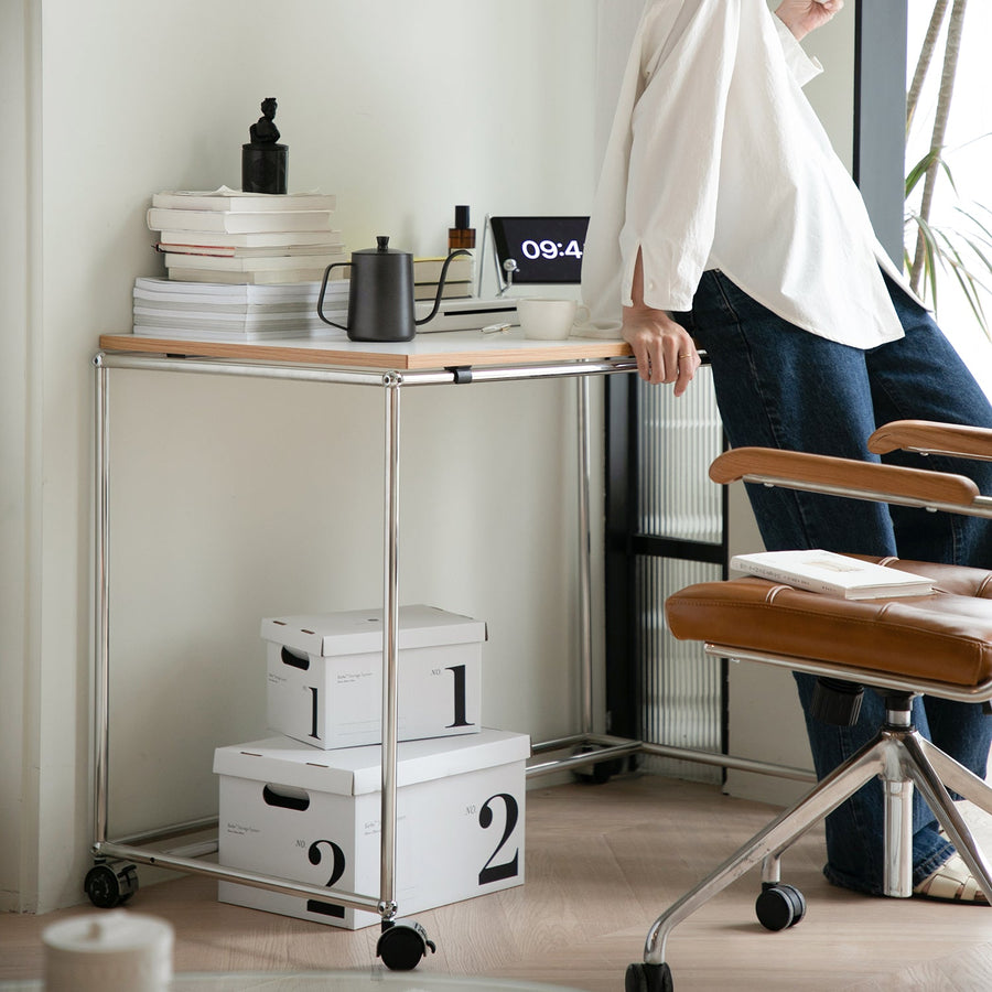 Bauhaus steel wheeled study table usm primary product view.