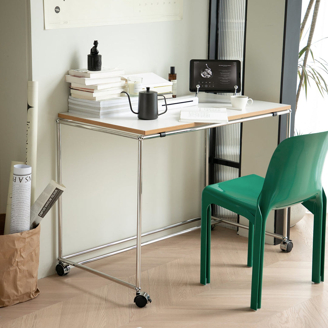 Bauhaus steel wheeled study table usm material variants.