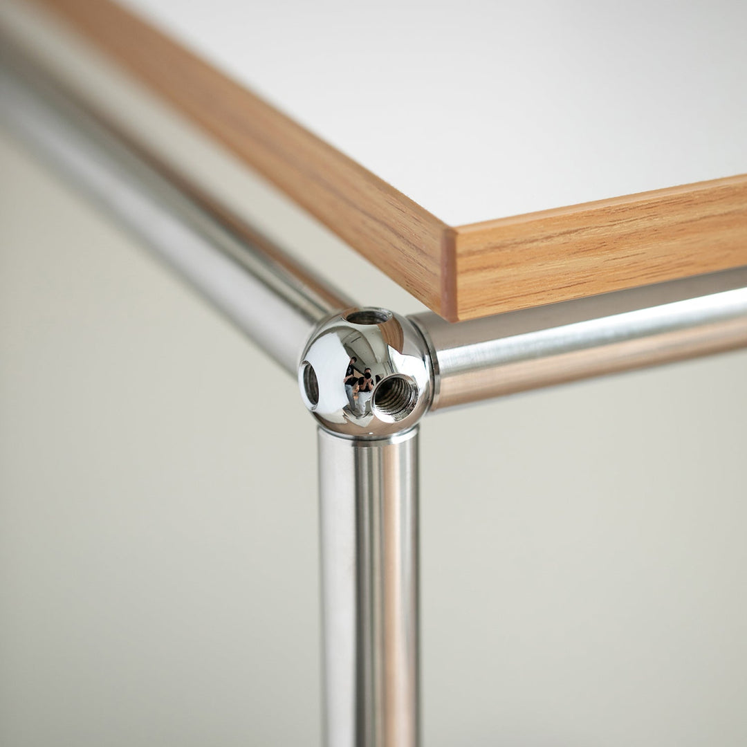 Bauhaus steel wheeled study table usm with context.