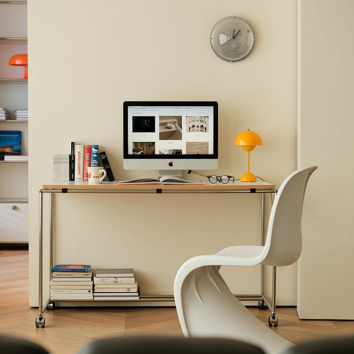 Bauhaus steel wheeled study table usm in close up details.