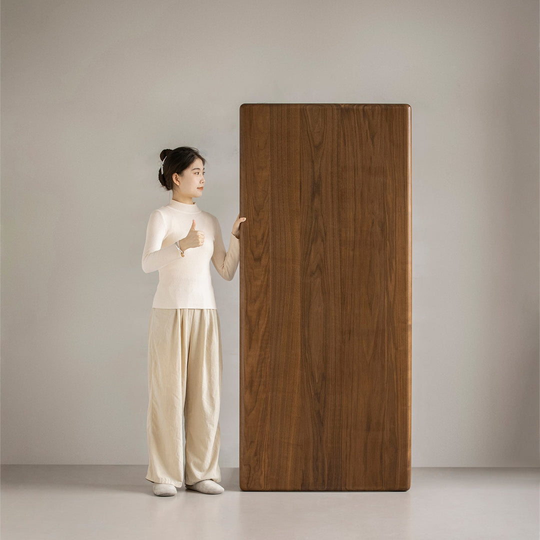 Mininalist walnut wood dining table conti in panoramic view.