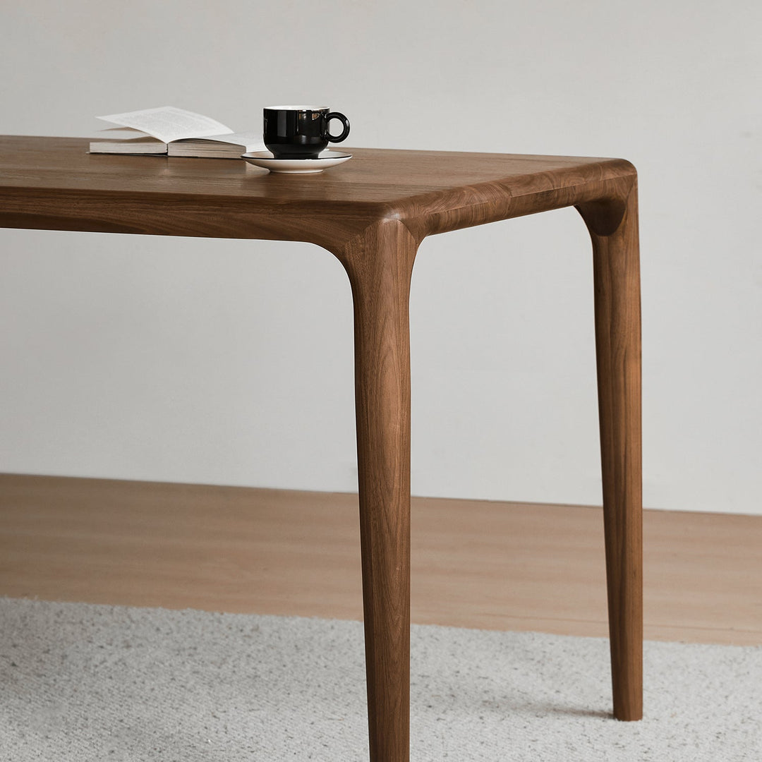 Mininalist walnut wood dining table conti in real life style.