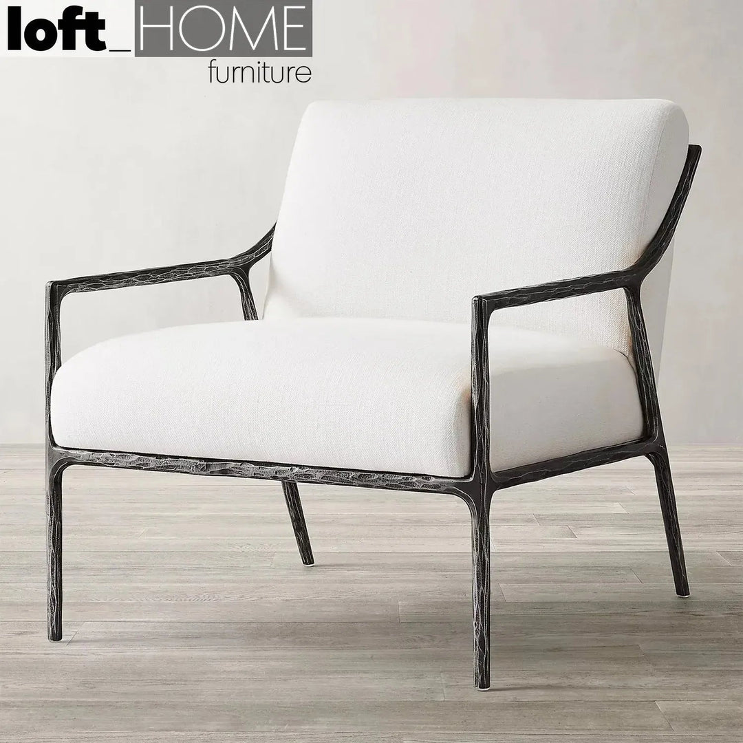 Industrial fabric 1 seater sofa thaddeus slope with context.