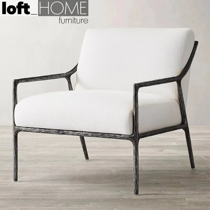 Industrial fabric 1 seater sofa thaddeus slope with context.