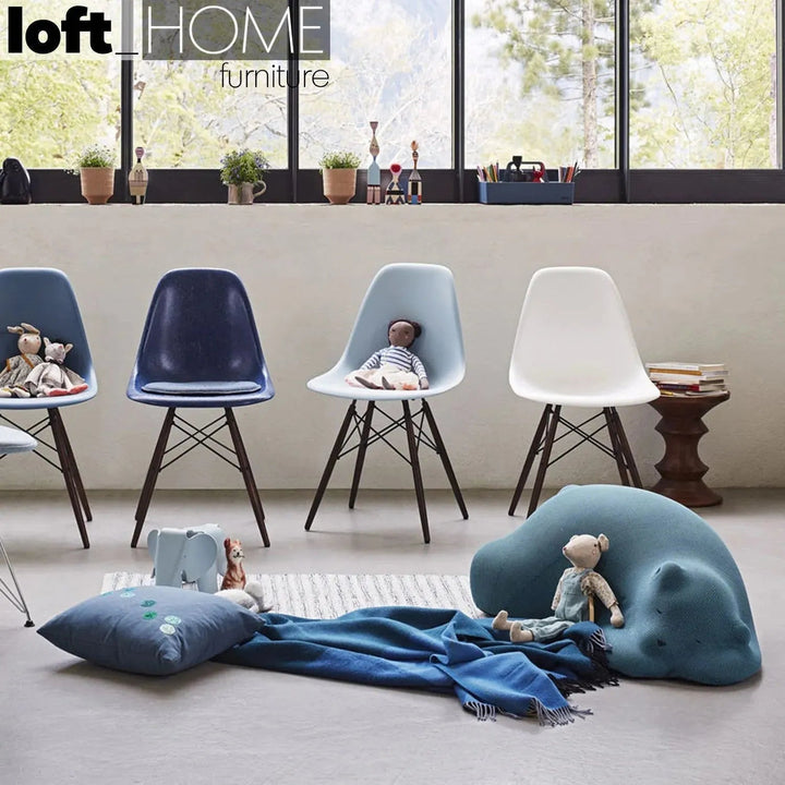 Contemporary knit fabric ottoman resting bear in details.