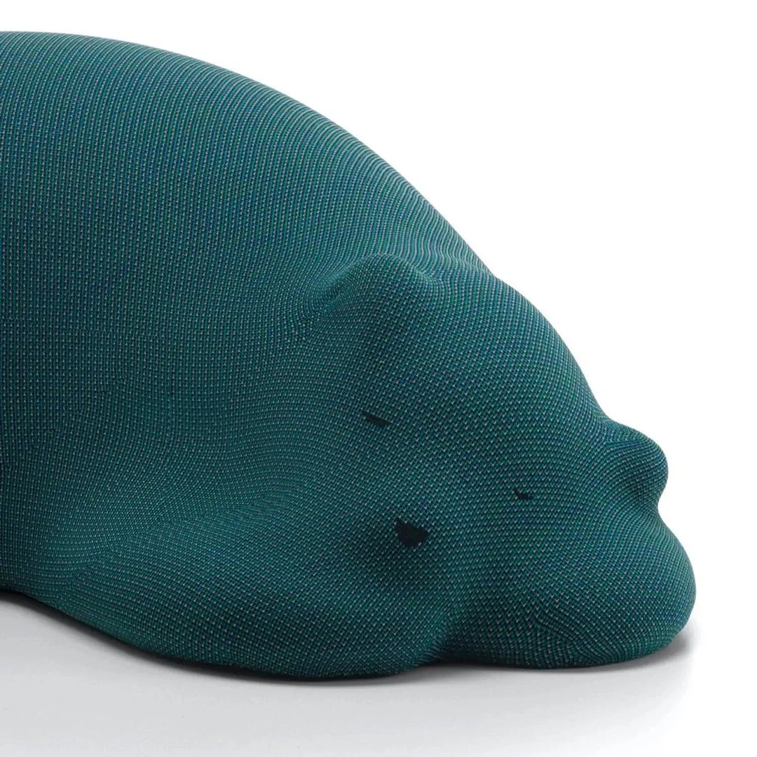 Contemporary knit fabric ottoman resting bear conceptual design.