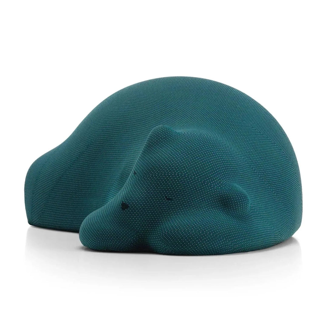Contemporary knit fabric ottoman resting bear layered structure.