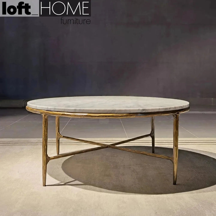 Minimalist marble coffee table thaddeus round in panoramic view.