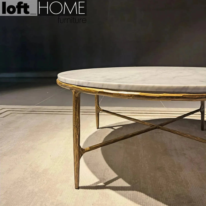 Minimalist marble coffee table thaddeus round in still life.