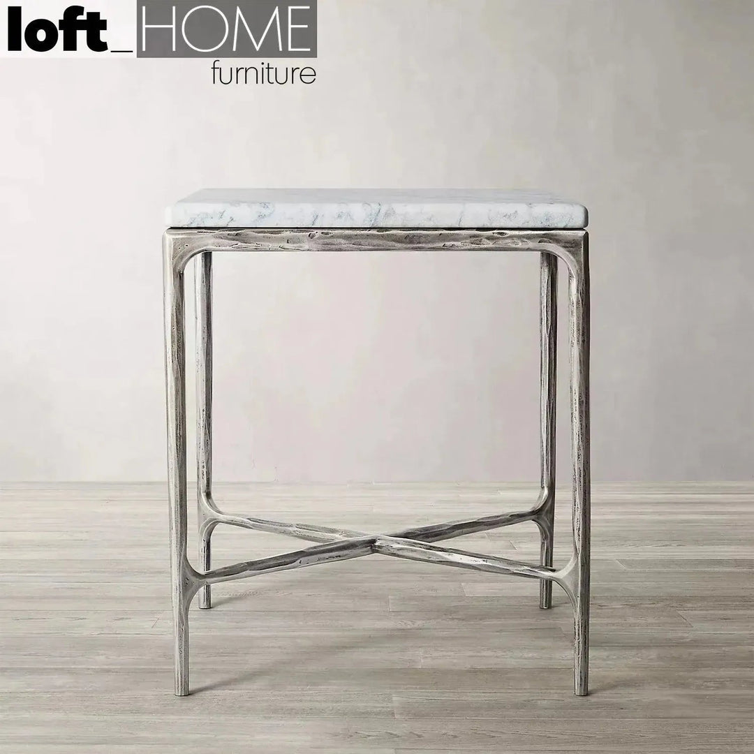 Minimalist marble side table thaddeus square in close up details.