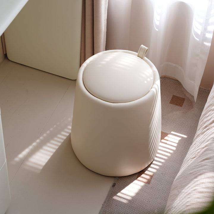 Modern microfiber leather dressing stool pudding in still life.