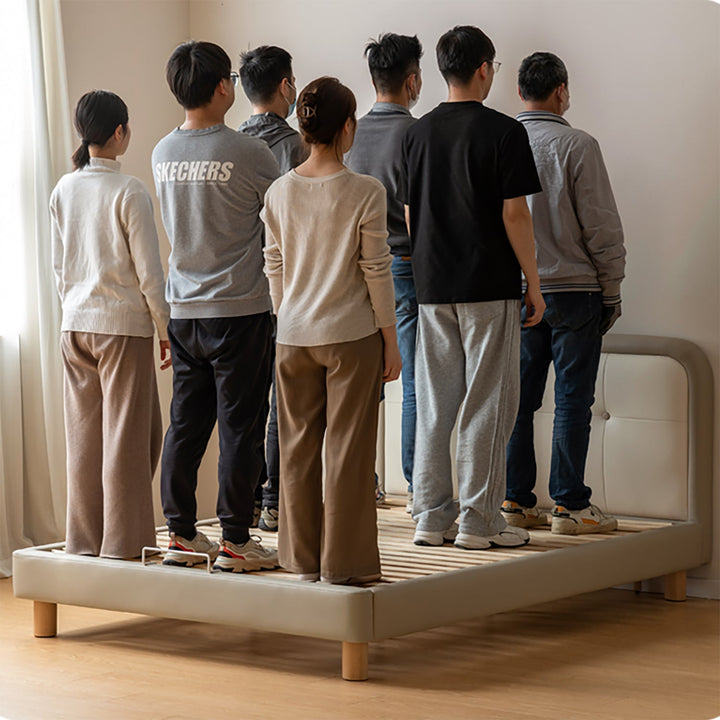 Modern microfiber leather kids bed cradle in panoramic view.