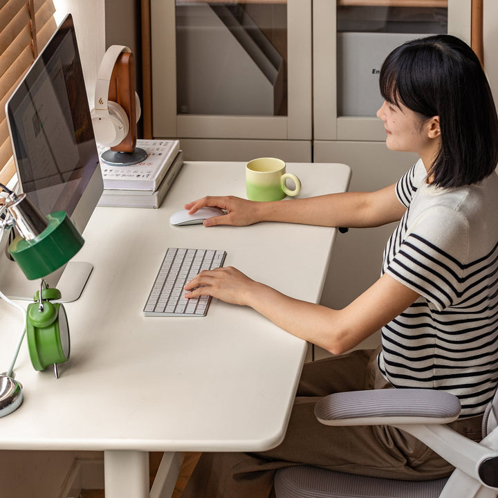 Modern rubber wood electric height adjustable study table oracle with context.