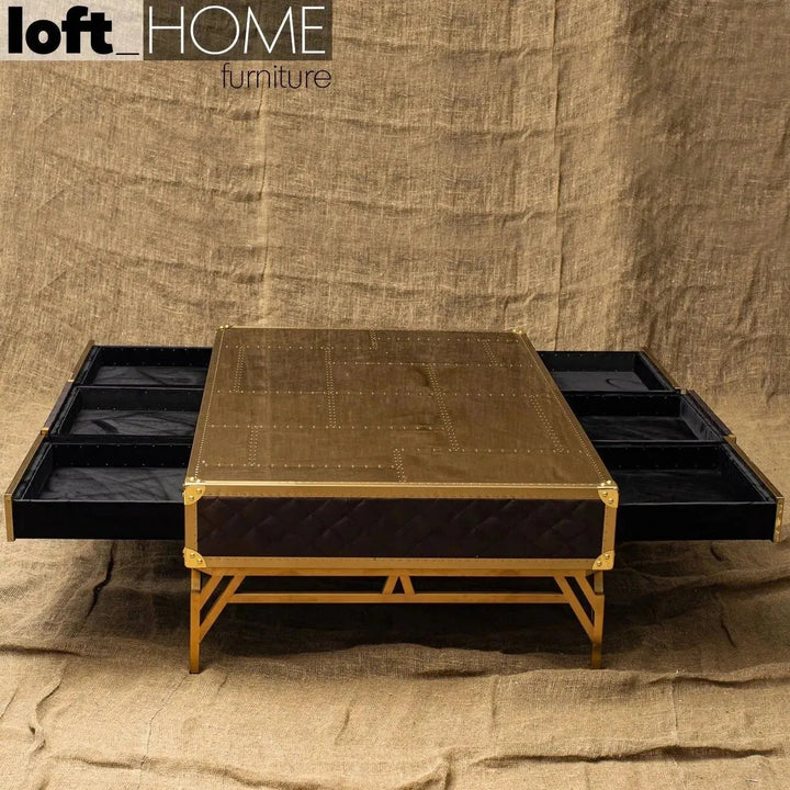 Vintage genuine leather coffee table osmond with context.