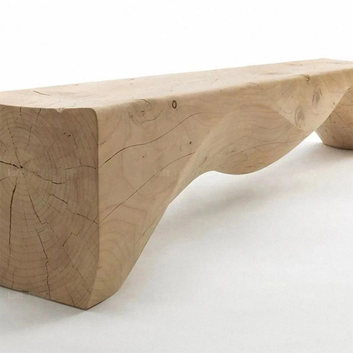 Rustic wood bench mountains with context.