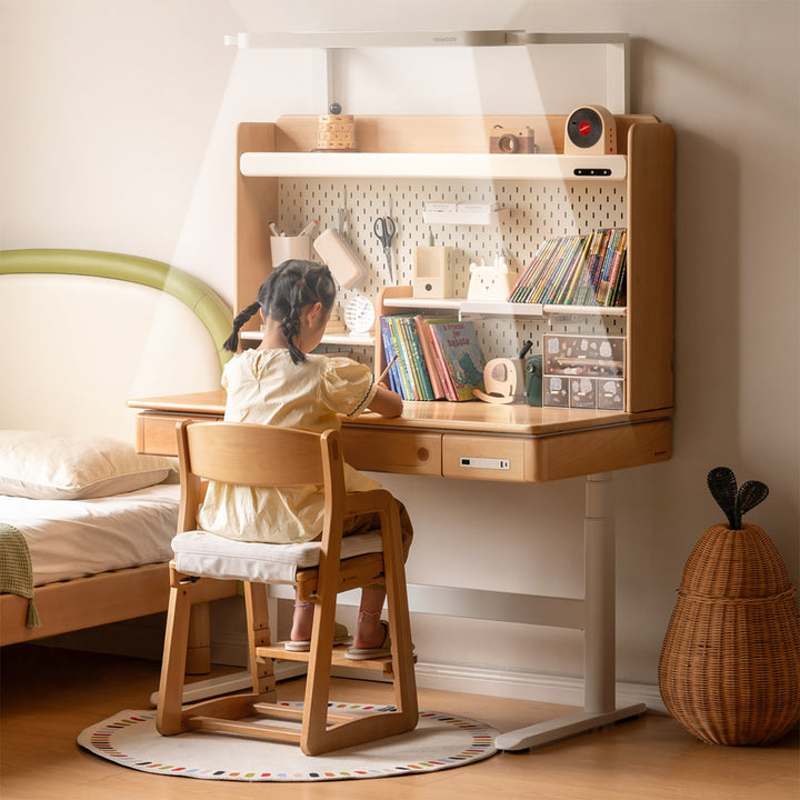 Scandinavian beech wood electric height adjustable kids study table with intergrated led light orbita primary product view.