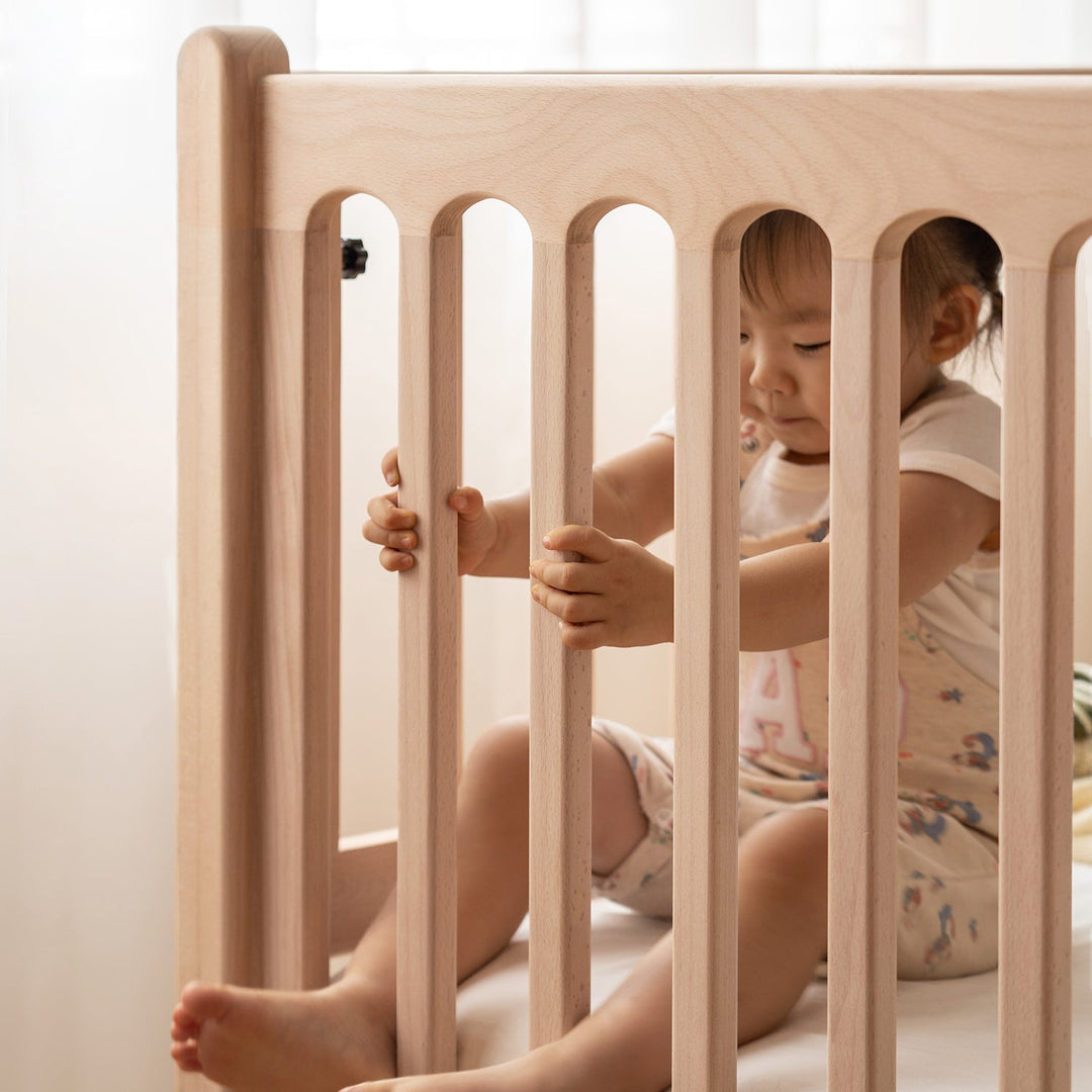 Scandinavian beech wood height adjustable kids sidecar bed with mattress set sova in details.