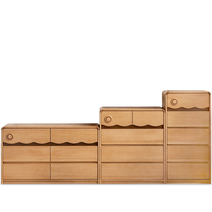 Scandinavian beech wood kids chest of drawers creamy in white background.