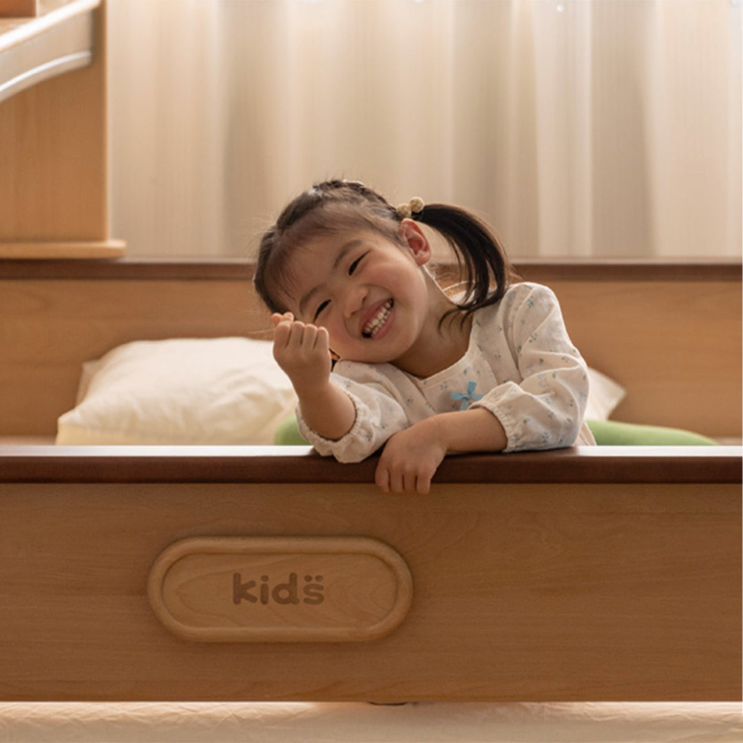 Scandinavian beech wood kids storage bed arloe in panoramic view.