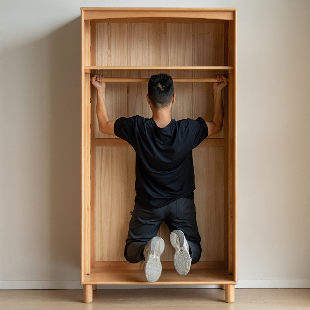Scandinavian beech wood wardrobe peblo in still life.