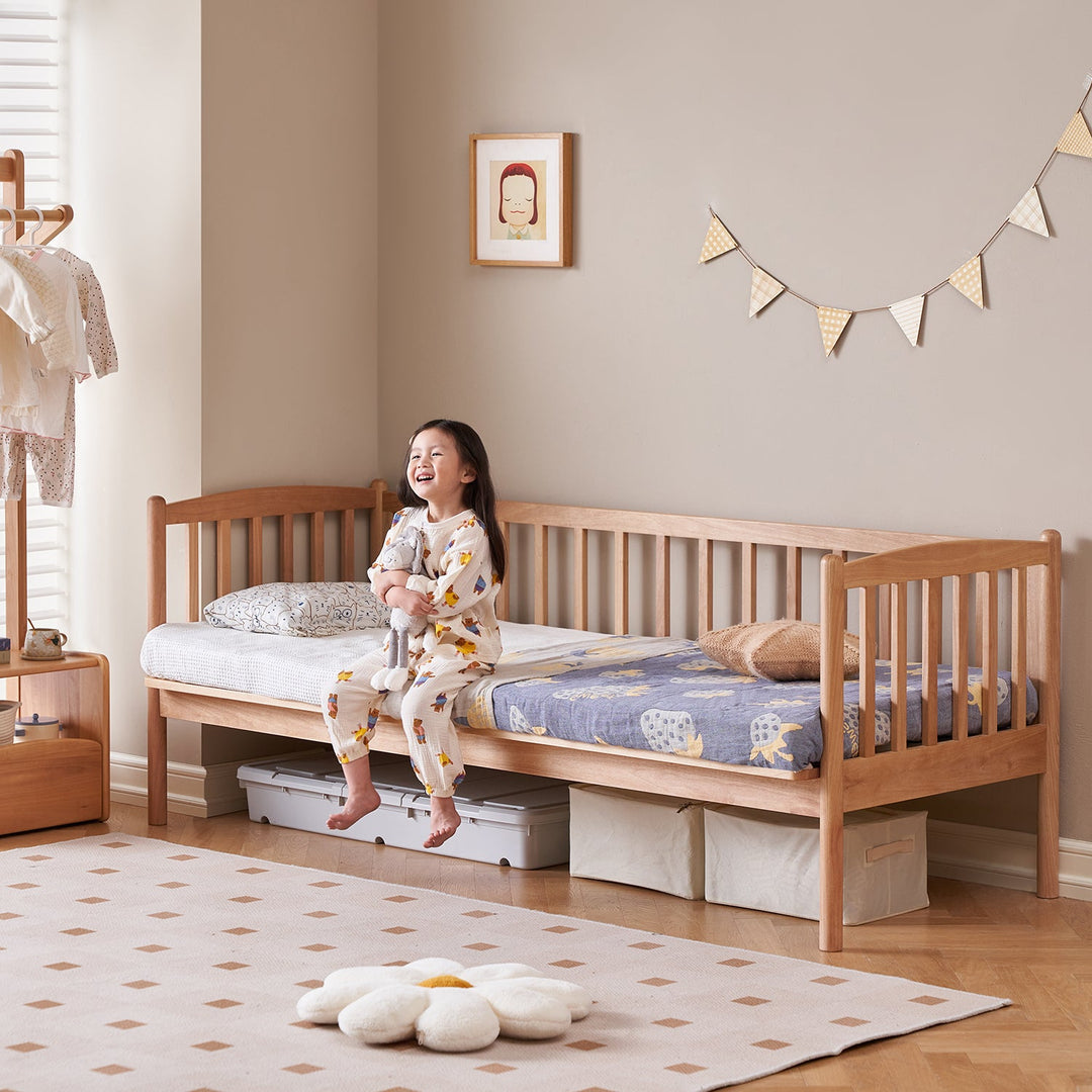 Scandinavian birch wood kids sidecar bed with mattress set myka with context.