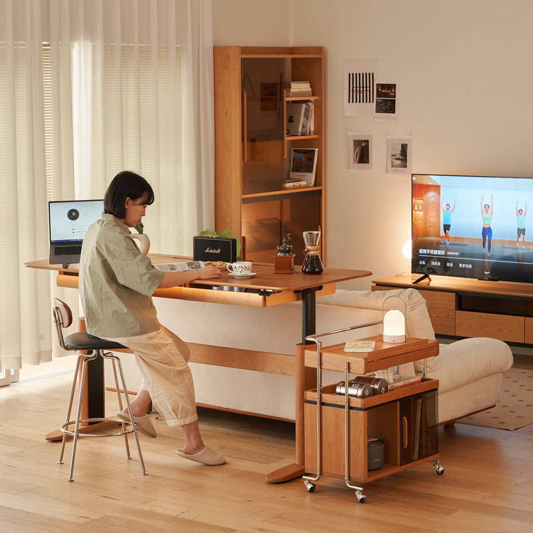 Scandinavian cherry wood electric height adjustable study table up environmental situation.
