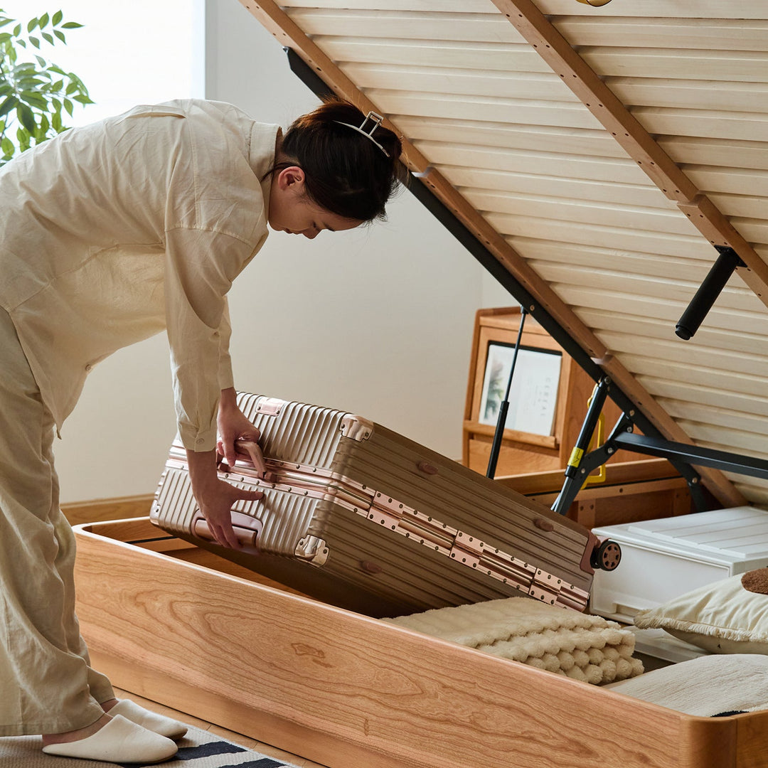 Scandinavian cherry wood lift-up storage bed square box with context.