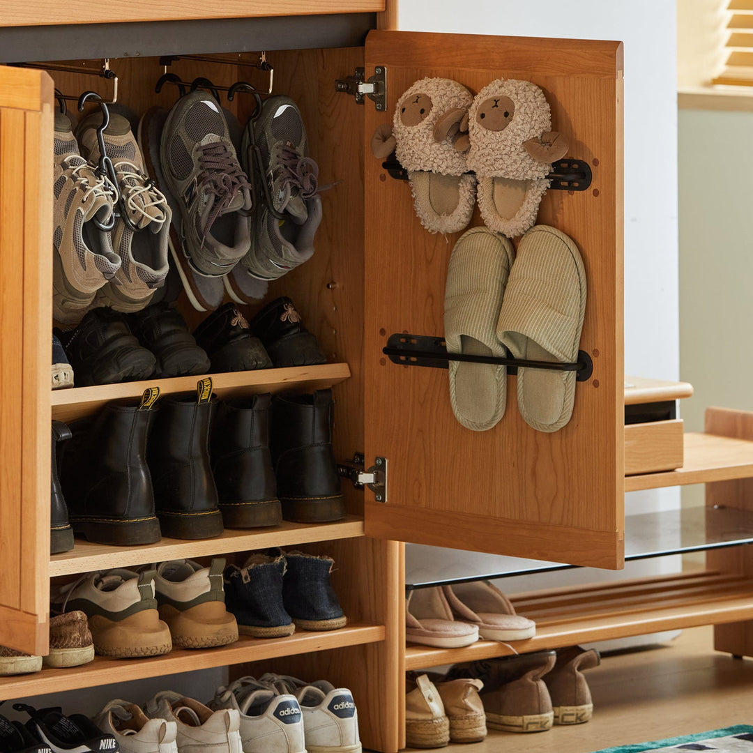 Scandinavian cherry wood modular shoe cabinet harbor with context.