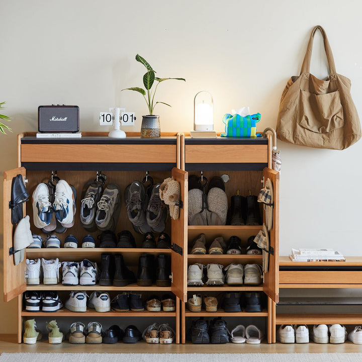 Scandinavian cherry wood modular shoe cabinet harbor in still life.