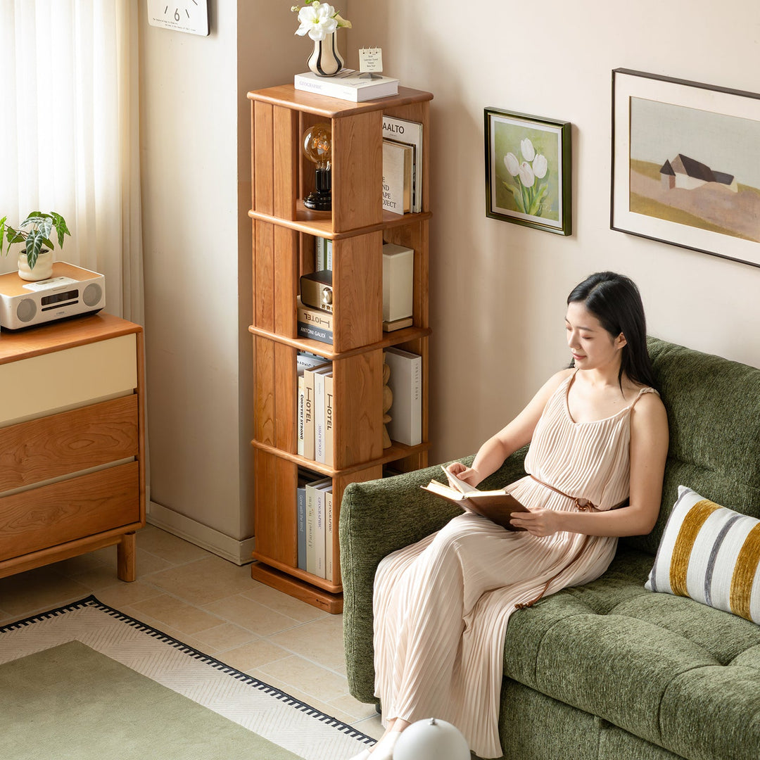 Scandinavian cherry wood revolving bookshelf rotterdam with context.