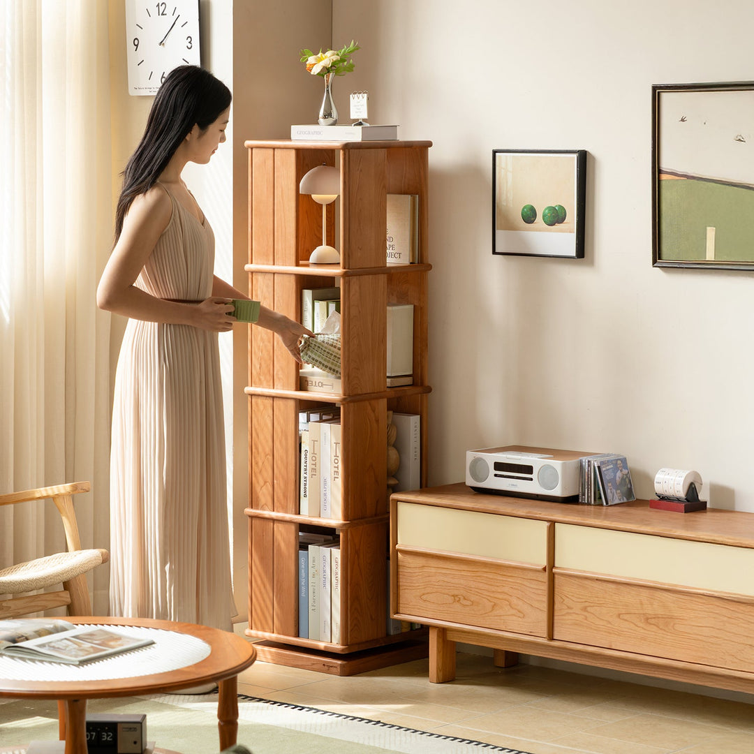 Scandinavian cherry wood revolving bookshelf rotterdam in panoramic view.