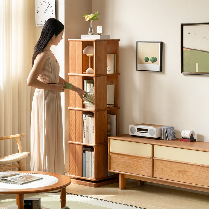 Scandinavian cherry wood revolving bookshelf rotterdam in panoramic view.