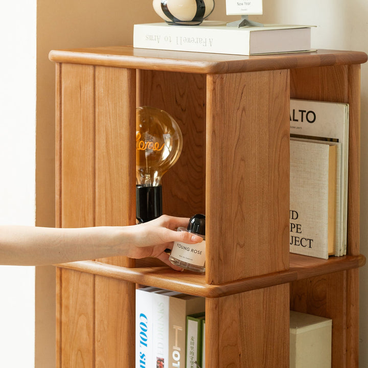 Scandinavian cherry wood revolving bookshelf rotterdam in still life.