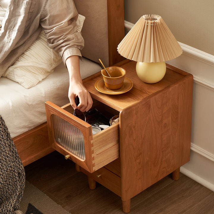 Scandinavian cherry wood side table skylar with context.