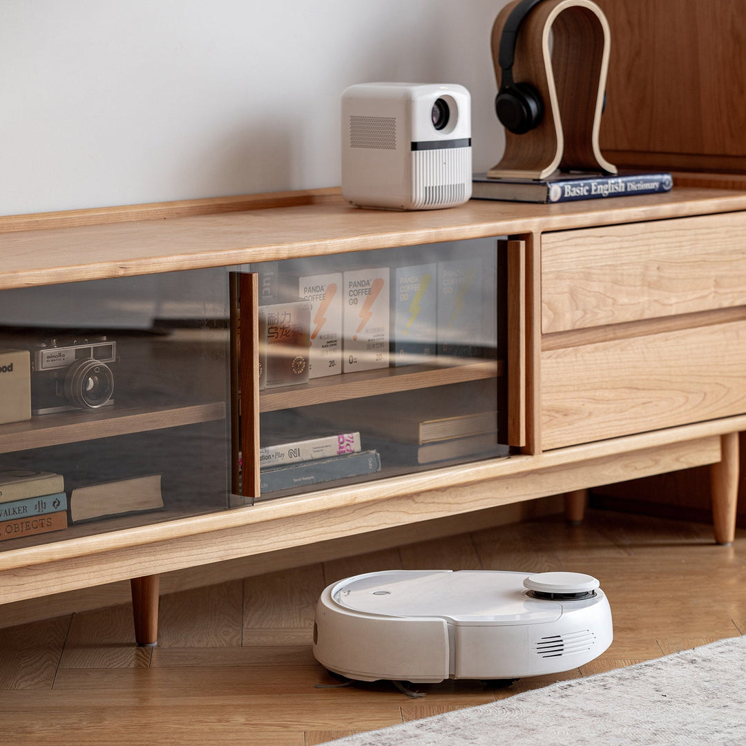 Scandinavian cherry wood tv console vista in close up details.