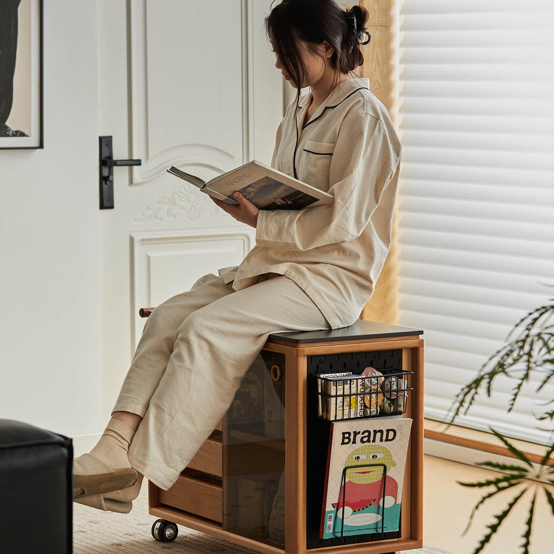 Scandinavian cherry wood wheeled trolley side table bus in details.