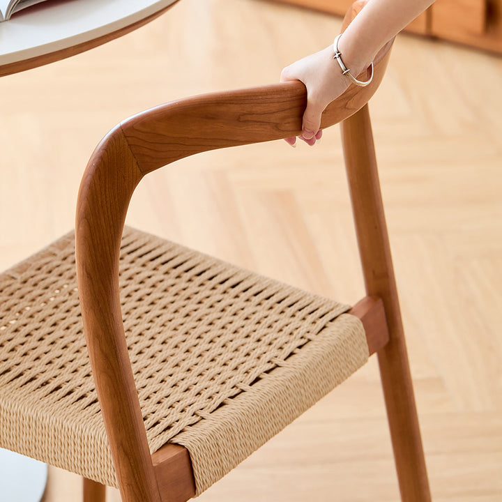Scandinavian cherry wood woven rope dining chair sona in close up details.