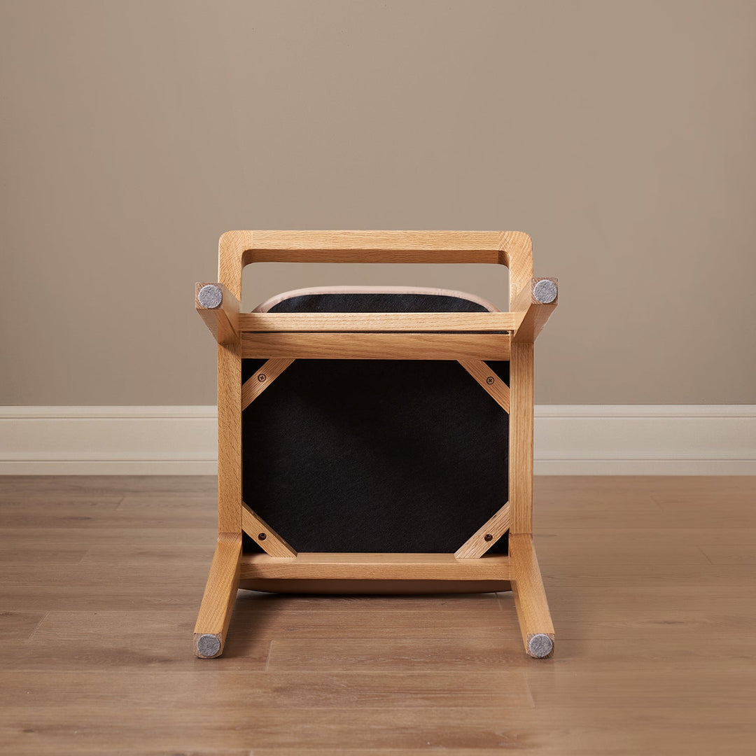 Scandinavian oak wood cat scratch resistant leather dressing chair hemu in panoramic view.