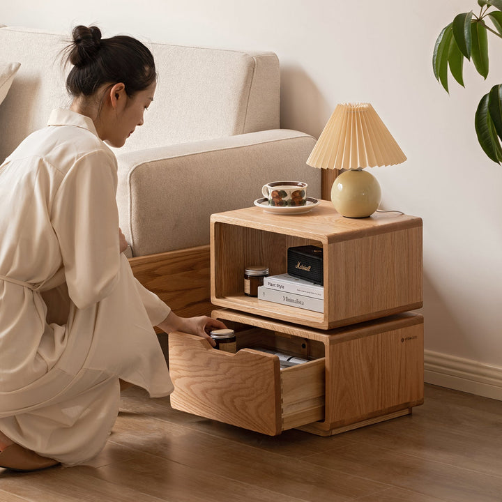 Scandinavian oak wood revolving side table twist with context.