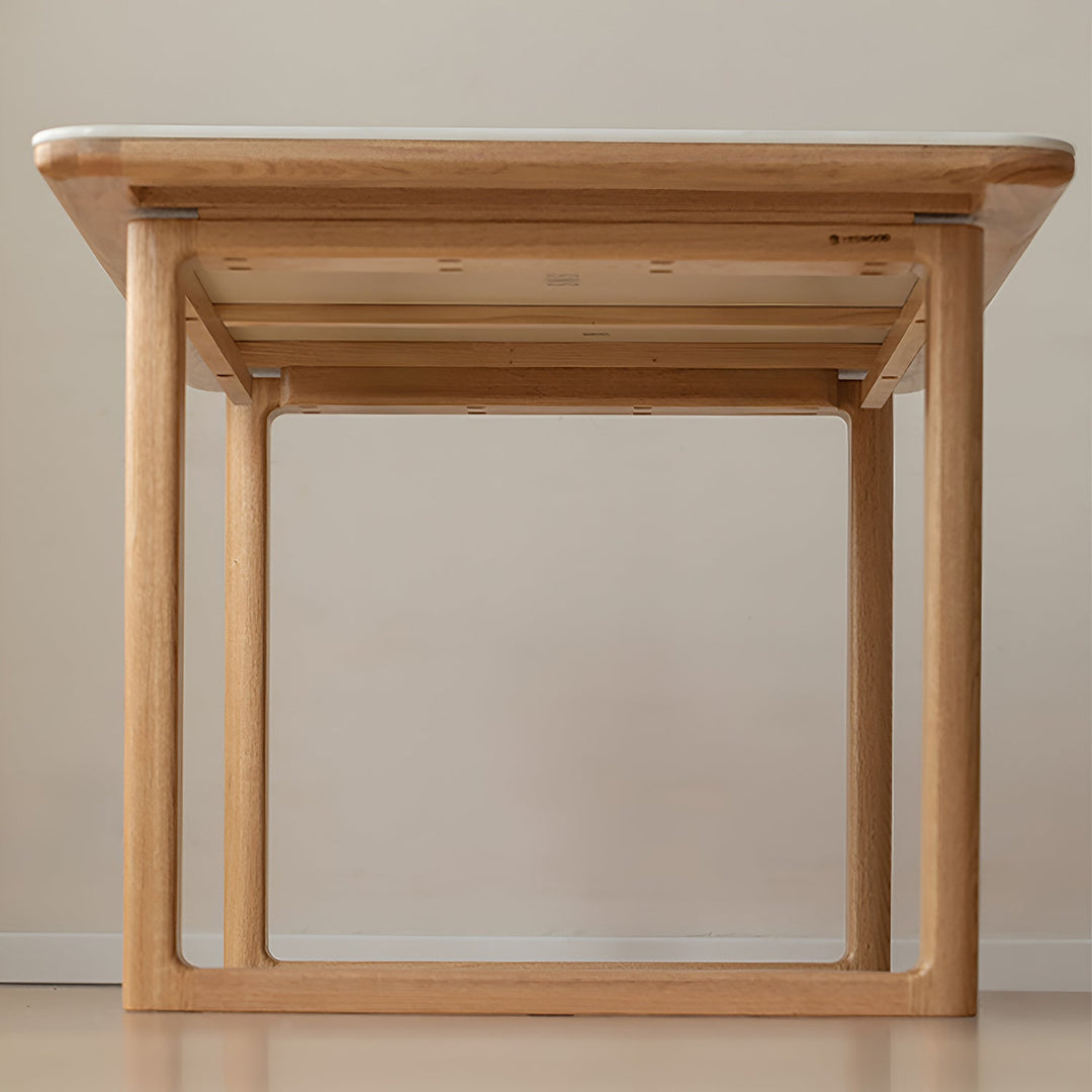 Scandinavian oak wood sintered stone dining table anchor in panoramic view.